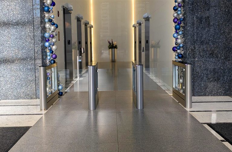 Fastlane Glassgate 150 Plus optical turnstile in a corporate lobby